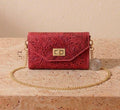 Red hand-tooled leather wallet purse with gold chain strap