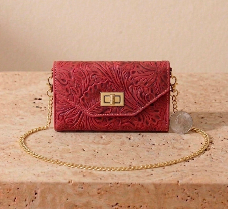 Red hand-tooled leather wallet purse with gold chain strap